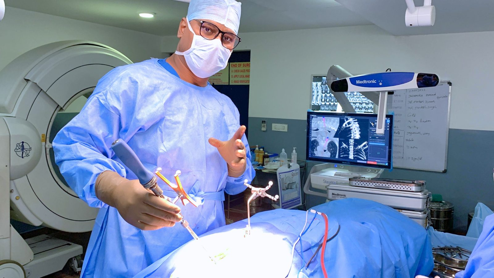 Dr. Mahesh Kumar operating with O-Arm and StealthStation navigation